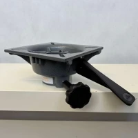 Obrotowa podstawa fotela z blokadą obrotu pod nogę fotela